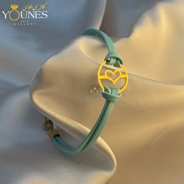 تصویر دوم دستبند طلا چرم دولاین قلب توخالی